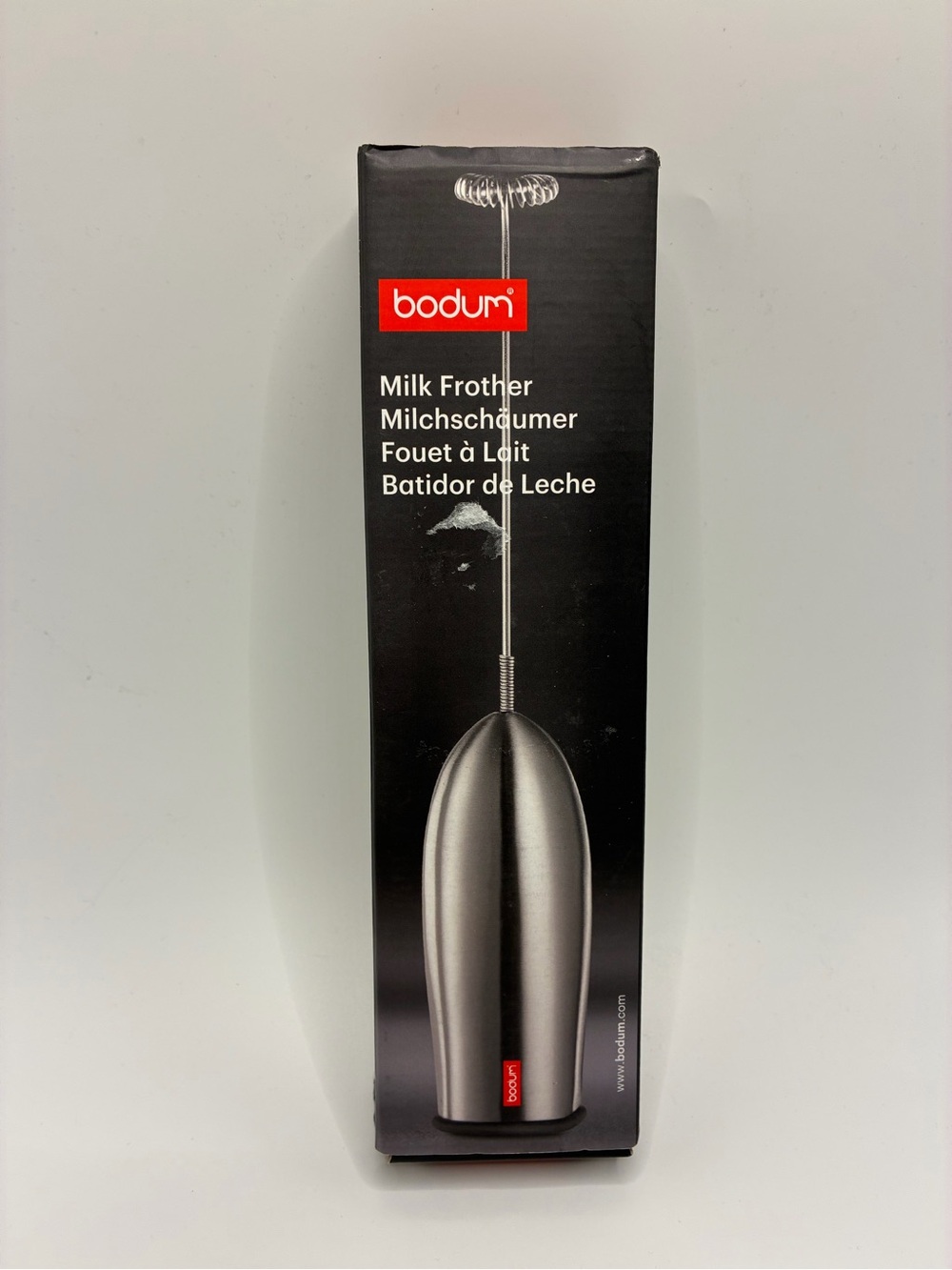 Bodum Ergonomic Lightweight Milk Frother in Metallic Silver and Red Detail